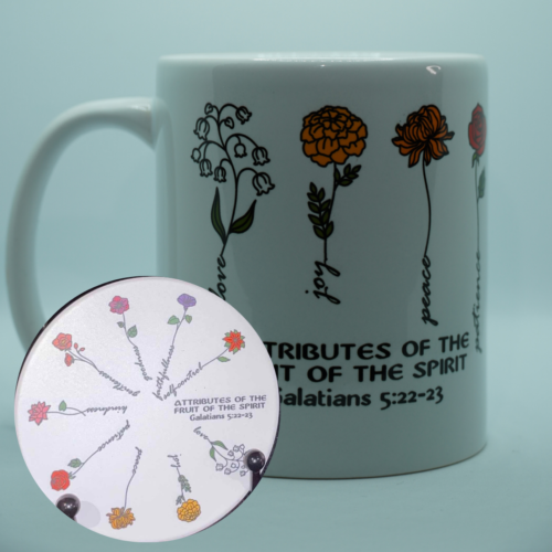 White mug and round coaster with flowers and stems made up of the words of Galatians 5:22-23 (Text saying "Attributes of the Fruit of the Spirit)