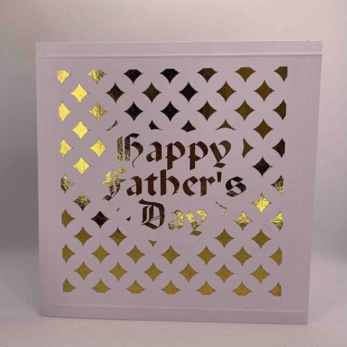 Square greeting card gold foil text saying Happy Father's Day embossed borders